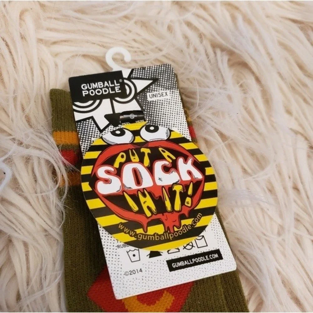 socks that read Camp in gold letters‎